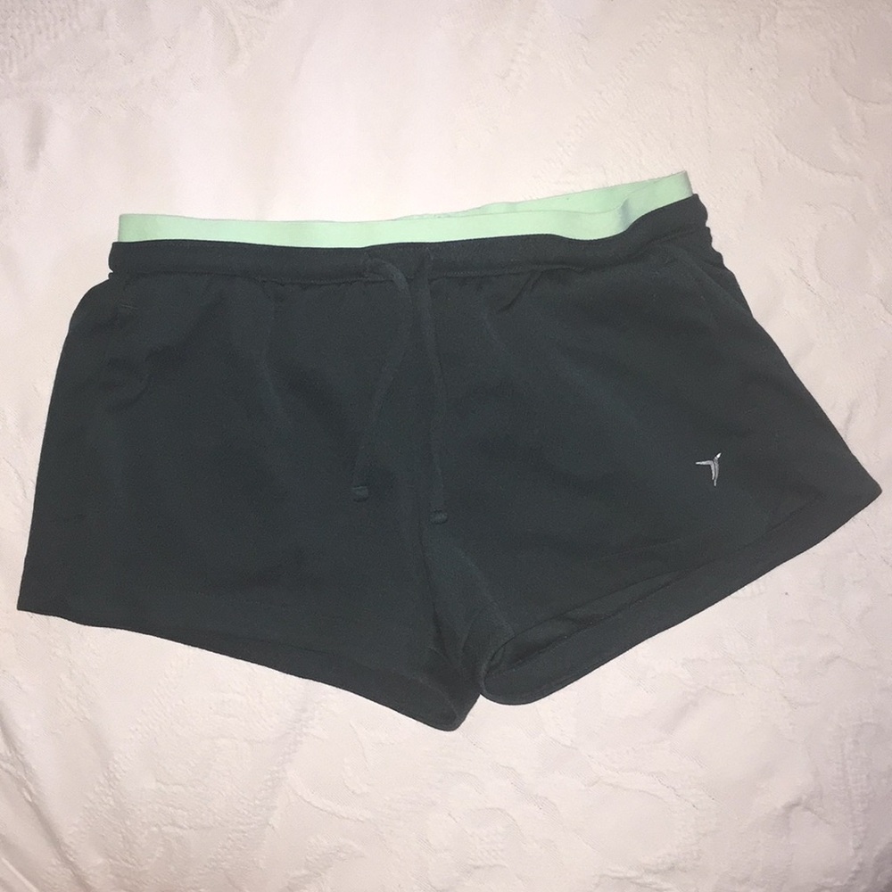 Green, athletic, go dry shorts.